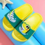 Chaussons Dinosaure Flottant Jaunes