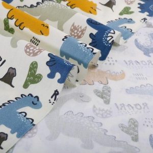 tissu coton au metre dinosaure